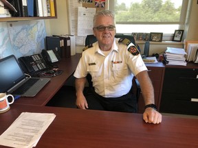 Prince Edward County Fire Chief Scott Manlow is pictured in his McDonald Drive office in Picton. Manlow will hang up his fire hat on June 30 after 32 years, including the last 14 as chief.
