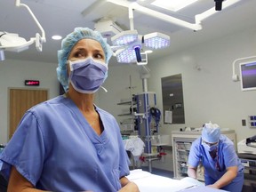 Kristina Cruess stands in a Belleville General Hospital operating room in 2014. Cruess is now director of QHC's surgical program and said the corporation will reach 60 per cent of outpatient surgical capacity starting June 24.