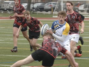 Brantford Collegiate Institute's Marcus Cohoon, shown in action in Brant County high school senior boys rugby, is a recipient of the Ed O'Leary Memorial Award. Expositor file photo