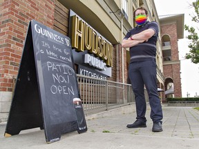 Connor McGrath, general manager of Hudson Public Kitchen and Bar stands outside his Dalhousie Street eatery in downtown Brantford.