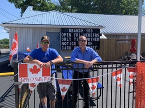 Chris Tietz, first-vice president of the Royal Canadian Legion Port Dover, Branch 158, and president Wally Breen pose on the patio the branch opened to members on Friday.