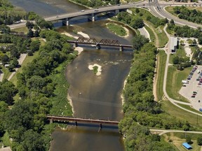 A view of the Grand River running through Brantford's core. At top is the Lorne Bridge, while two former railway bridges have been repurposed into pedestrian bridges. All the spans are part of a study.