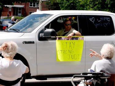 One of the parade's participants wears a party hat while bringing encouragement. (RONALD ZAJAC/The Recorder and Times)