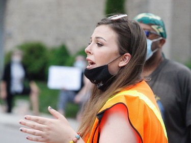 March organizer Chelsea van Stralen speaks at the end of the demonstration in front of city hall. (RONALD ZAJAC/The Recorder and Times)