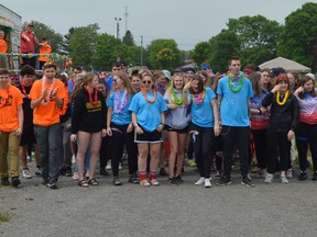 Participants in South Grenville District High School's 'Aloha 2019' Relay for Life line up for the opening lap of the cancer society fundraiser. The national Relay at Home virtual gathering that has replaced Relay for Life because of the COVID-19 pandemic is set for Saturday from 7 to 9 p.m. (FILE PHOTO)