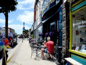 By closing King Street to vehicular traffic, patios such as this one in front of the Old English Pub will be able to expand out to take up the vacant parking spaces while pedestrians will be able to stroll safely down the centre lanes, maintaining social distancing.