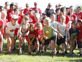 Youngsters get set for the mass start of the 1-km event at the 2019 Canada Day Runs in Brockville. A special 2020 at-home version of the annual runs for people of all ages will take place on Wednesday, with proceeds going to the Brockville and Area Food Bank.
File photo/The Recorder and Times