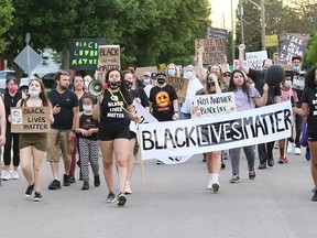 Marchers take part in a Black Lives Matter demonstration on King Street in Chatham on June 5. Mark Malone/Postmedia Network