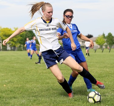 Chatham-Kent Golden Hawks' Camille Blain (9) protects the ball from Villanova Wildcats' Jalyn Cirino in the second half of the SWOSSAA 'AAA' senior girls' soccer final at the Chatham-Kent Community Athletic Complex in Chatham, Ont., on Wednesday, May 30, 2018. Mark Malone/Chatham Daily News/Postmedia Network
