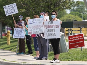 Health-care workers and supporters participate in a rally about pandemic pay at the Chatham-Kent Health Alliance's Chatham hospital in Chatham, Ont., on Tuesday, June 2, 2020. Mark Malone/Chatham Daily News/Postmedia Network