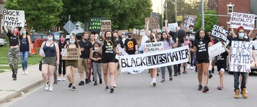 Marchers take part in a Black Lives Matter demonstration on King Street in Chatham, Ont., on Friday, June 5, 2020. Mark Malone/Chatham Daily News/Postmedia Network