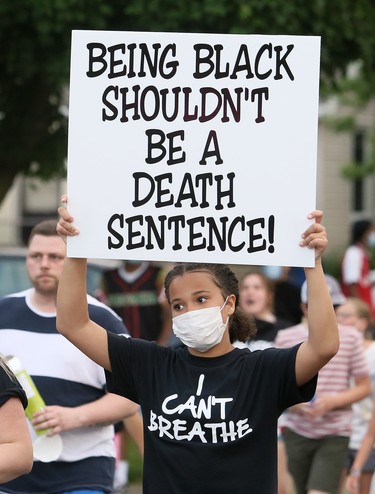 Marchers take part in a Black Lives Matter demonstration on King Street in Chatham, Ont., on Friday, June 5, 2020. Mark Malone/Chatham Daily News/Postmedia Network