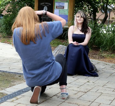 Tristan Reaume poses for photographer Ella Dam in downtown Chatham in Chatham, Ont., on Friday, June 26, 2020. Dam volunteered her services to FreeHelpCK, which held a drive-up prom for Grade 12 students whose school prom was cancelled because of the COVID-19 pandemic. Reaume is in Grade 12 at Ursuline College Chatham. Mark Malone/Chatham Daily News/Postmedia Network