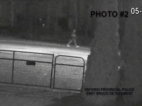 Grey Bruce OPP would like to speak with this person of interest captured twice  on video tape May 2 on Grant Ave,.in Meaford, as they investigate the first-degree murder of Emerson Sprung.