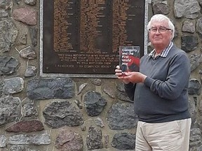 Alexandria author Robin Flockton with a copy of this new book, Glengarry and the First World War, at the Glengarry Cenotaph on Sunday, May 31.Handout/Cornwall Standard-Freeholder/Postmedia Network

Handout Not For Resale