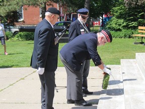 George O'Dair lays a wreath during the 76th anniversary of D-Day ceremony in Cornwall, on Saturday morning. Photo  on Saturday, June 6, 2020, in Cornwall, Ont. Todd Hambleton/Cornwall Standard-Freeholder/Postmedia Network