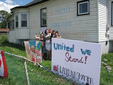 Residents along the protest route getting ready to support the marchers. Photo on Saturday, June 6, 2020, in Cornwall, Ont. Todd Hambleton/Cornwall Standard-Freeholder/Postmedia Network