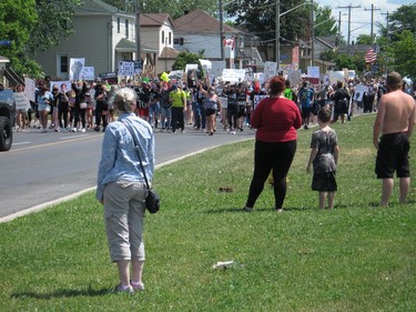 Some of the people who gathered to see the march on Cumberland St. as it approached Ninth St. Photo on Saturday, June 6, 2020, in Cornwall, Ont. Todd Hambleton/Cornwall Standard-Freeholder/Postmedia Network