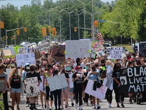 Marchers heading east on Ninth St. Photo on Saturday, June 6, 2020, in Cornwall, Ont. Todd Hambleton/Cornwall Standard-Freeholder/Postmedia Network