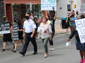 Cornwall Police Chief Danny Aikman and Cornwall Mayor Bernadette Clement early on in the protest walk. Photo on Saturday, June 6, 2020, in Cornwall, Ont. Todd Hambleton/Cornwall Standard-Freeholder/Postmedia Network