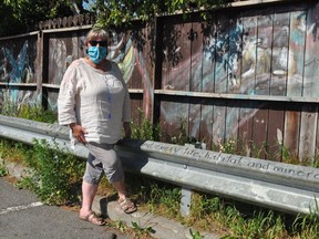 Cornwall artist Jacqueline Milner recently completed The Love Project, an eight panel art piece on a fence overlooking a Cornwall downtown parking lot. Photo taken on Sunday June 21, 2020 in Cornwall, Ont. Francis Racine/Cornwall Standard-Freeholder/Postmedia Network