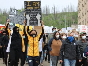 Marchers at an anti-racism protest supporting Black Lives Matter in downtown Fort McMurray on Saturday, June 6, 2020. Vincent McDermott/Fort McMurray Today/Postmedia Network ORG XMIT: POS2006062105194366