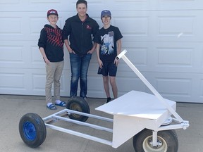 L-R: Owen Olsen, Brandon Barth and Zack Stanger will be serving the folks in Hanna a tasty treat this summer with their ice cream cart - which will tour around town selling frozen treats for cash all summer long. Jackie Irwin/Postmedia