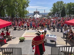 Kingston town crier Chris Whyman wishes everyone a happy Canada Day at the City of Kingston's civic ceremony outside City Hall on July 1, 2019. (Julia McKay/The Whig-Standard)