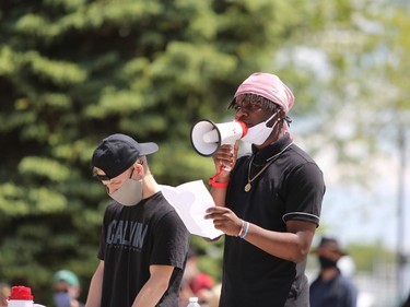 Casey Heffernan and Hawani Brooks are two organizers of the Justice for George Floyd & All Police Racism Victims event at Confederation Park in downtown Kingston on Saturday, June 6, 2020. Meghan Balogh/The Whig-Standard/Postmedia Network