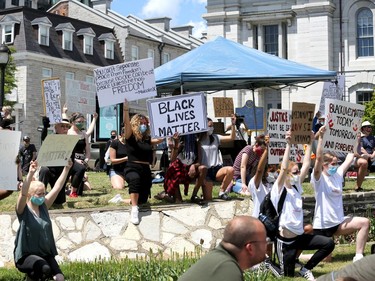 Protesters took a knee and observed a moment of silence for victims of racial discrimination during a protest at Confederation Park in downtown Kingston on Saturday, June 6, 2020. Meghan Balogh/The Whig-Standard/Postmedia Network