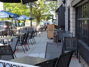 The patio outside The Merchant Tap House has tables situated so patrons can observe physical distancing. (Matt Scace/For The Whig-Standard)