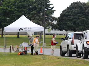 Traffic was light but steady at the drive-through COVID-19 assessment centre in the St. Lawrence College parking lot on Sunday. The one-day temporary location was set up to fill the gap as Kingston moved its assessment centre from the Memorial Centre to the Leon's Centre downtown. Regular centre hours resumed at the new location on Monday. People looking to be tested for COVID-19 can visit the Leon's Centre seven days a week from 9 a.m. to 4 p.m. They should enter the building at Gate 2. (Meghan Balogh/The Whig-Standard)