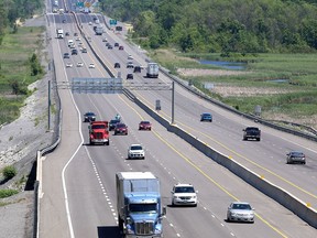 Traffic flows east and westbound on Highway 401 in Kingston on Thursday after the final leg of expanding the highway to six lanes through Kingston was completed. (Ian MacAlpine/The Whig-Standard)