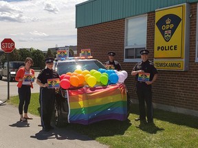 Members of the Temiskaming Detachment of the OPP are celebrating PRIDE Month. In the photo are PC Jennifer Smith, Left Rear:  Hali Armstrong (Detachment Administrative Clerk), Front right:  PC Marc Plante   Right rear:  Sgt. Wayne Brunke.
