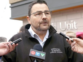 North Bay and District Labour Council president Henri Giroux speaks to reporters outside of the North Bay Parry Sound District Health Unit building on Oak Street, June 4, 2019. Nugget File Photo