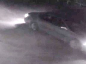 This surveillance camera photo shows a suspect vehicle that ran over multiple street signs in Lanigan recently.