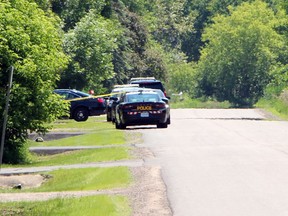 Ontarion Provincial Police vehicles are seen along Mountainview Road in Laurentian Valley Township just after noon on June 17. The road is closed for an ongoing police investigation.