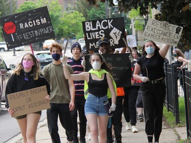 Participants chant as they walk through Pembroke's downtown core during a Black Lives Matter rally called Pembroke's March Against Injustice on Tuesday, June 9. Anthony Dixon