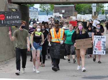 Participants chant as they walk through Pembroke's downtown core during a Black Lives Matter rally called Pembroke's March Against Injustice on Tuesday, June 9. Anthony Dixon