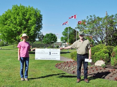 The Pembroke Petawawa District Community Foundation recently presented a cheque for $4,152.80 to the Pembroke Horticultural Society (PHS). Showing off the cheque are Catherine Hugli, PHS president (left) and Larry TerMarsch, PHS treasurer.