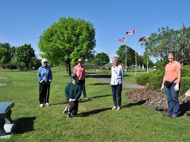 The dedicated volunteers of the Pembroke Horticultural Society, including  waterfront gardner Jenny Bucholtz (right), have been busy working in the flower beds at the Pembroke Waterfront Park.