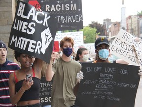 Participants chant as they walk through Pembroke's downtown core during a Black Lives Matter rally called Pembroke's March Against Injustice on Tuesday, June 9. Anthony Dixon