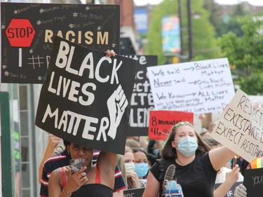 Participants chant as they walk through Pembroke's downtown core during a Black Lives Matter rally called Pembroke's March Against Injustice on Tuesday, June 9. Anthony Dixon