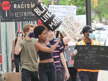 Participants chant as they walk through Pembroke's downtown core during a Black Lives Matter rally called Pembroke's March Against Injustice on Tuesday, June 9. Anthony Dixon