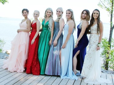 Fellowes High School graduates (from left) Victoria Simmonds, Mackenzie Schilling, Logan Lapointe, Emily Phannenhour, Taylor Schultz, Madison Mutlow and Rachel Williams gathered at the Pembroke Marina June 20 for prom photos.