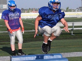 Ryder Flett jumps during practice with the Spruce Grove Cougars bantam and peewee teams Tuesday. The club is gearing up for another season and officials say those on teams have been impressive. Evan J. Pretzer/Reporter/Examiner