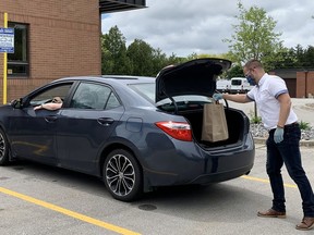 More than 4,300 items were loaned to over 1,200 people during the first week of the new curbside pickup program launched at select libraries across Lambton County. Handout/Sarnia Observer/Postmedia Network