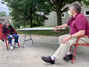 Spruce Lodge allowed visitors Wednesday for the first time in more than three months. Pictured, Ray Thiel gets some face-to-face time with his wife, Sandra. (Cory Smith, Beacon Herald)