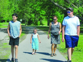 FAMILY OUTING: Alex, 10 "turning 11", with Olivia, 4, and Gabriel, 13, take an early afternoon stroll with Grandma Laura Robinson along the waterfront at Bellevue Park. ALLANA PLAUNT/SAULT THIS WEEK