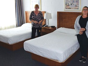 House of Kin operations manager Barb Henderson and fundraising and marketing co-ordinator Karly Bortolotti show one of the newly renovated rooms. Kevin McSheffrey